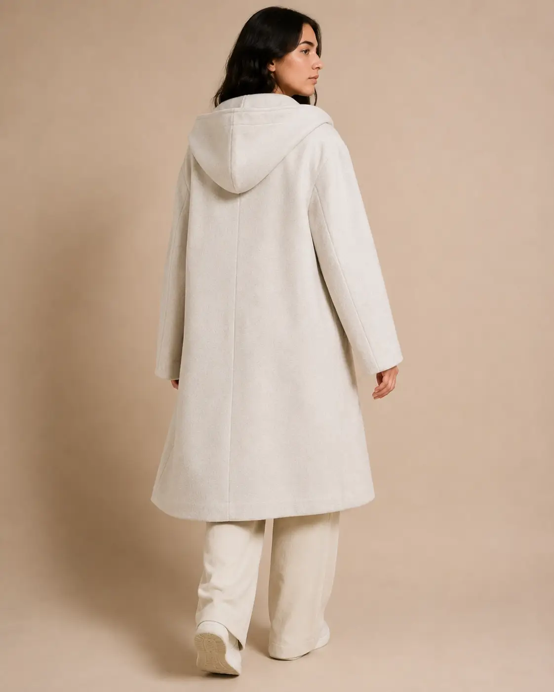 Model wearing ZARA ivory heather hooded coat — back