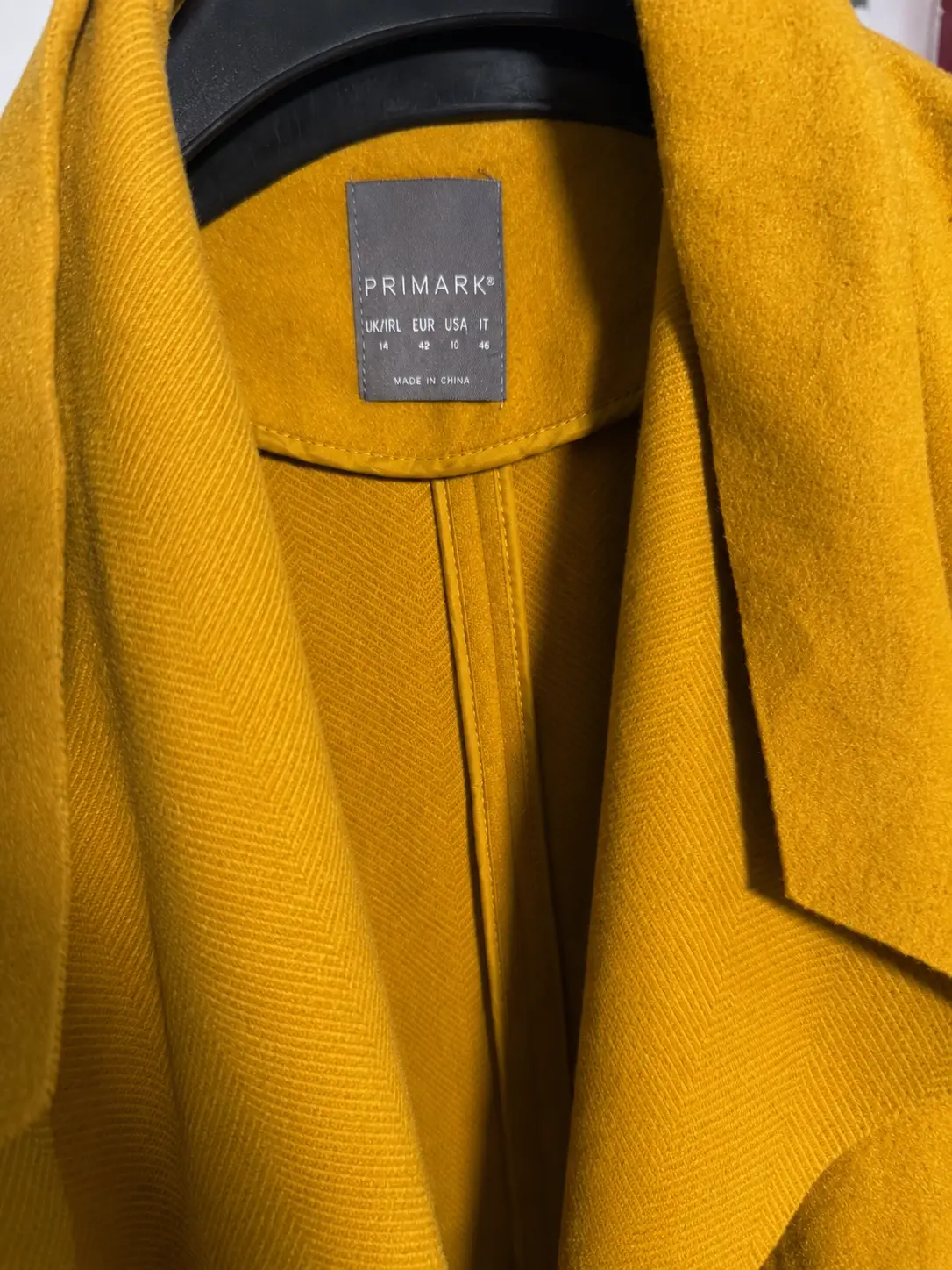 Construction detail of Primark Mustard Waterfall Open-Front Coat