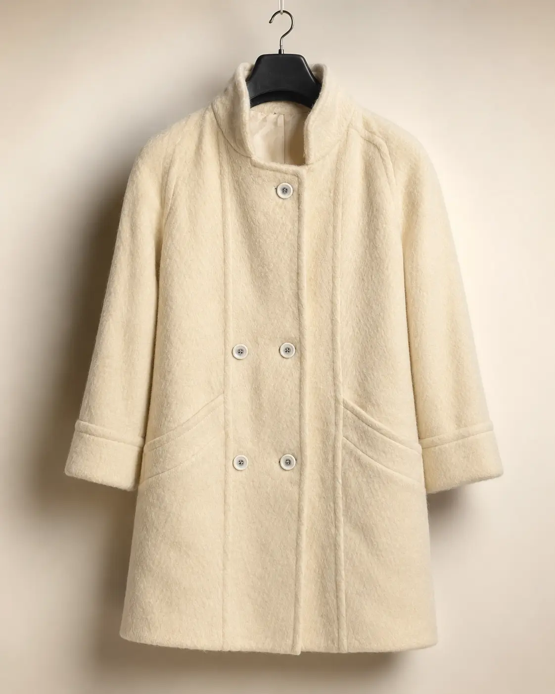 Front view of Ivory Boucle Cocoon Six-Button Coat