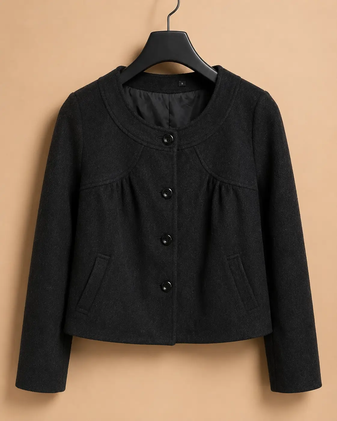 Front view of Black Wool Cropped Bow-Back Jacket