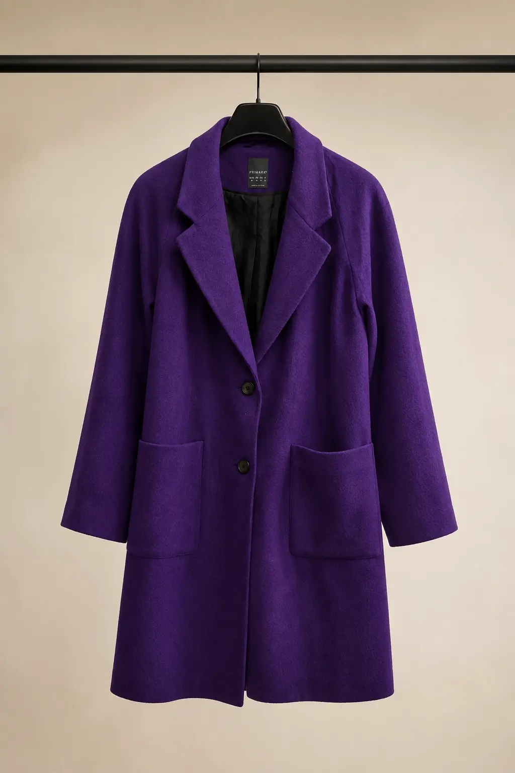 Front view of the royal purple Primark long overcoat.